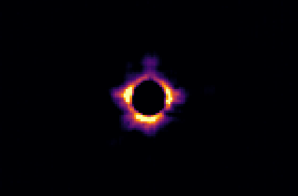 After halo subtraction: only a thinner, sharper ring remains around the hole.